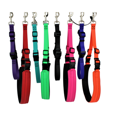 Hanging Biothane grooming belly bands showing different colours